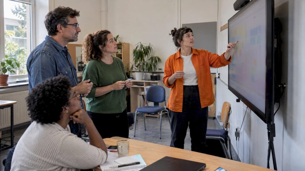 Facilitator guiding a structured digital whiteboard session